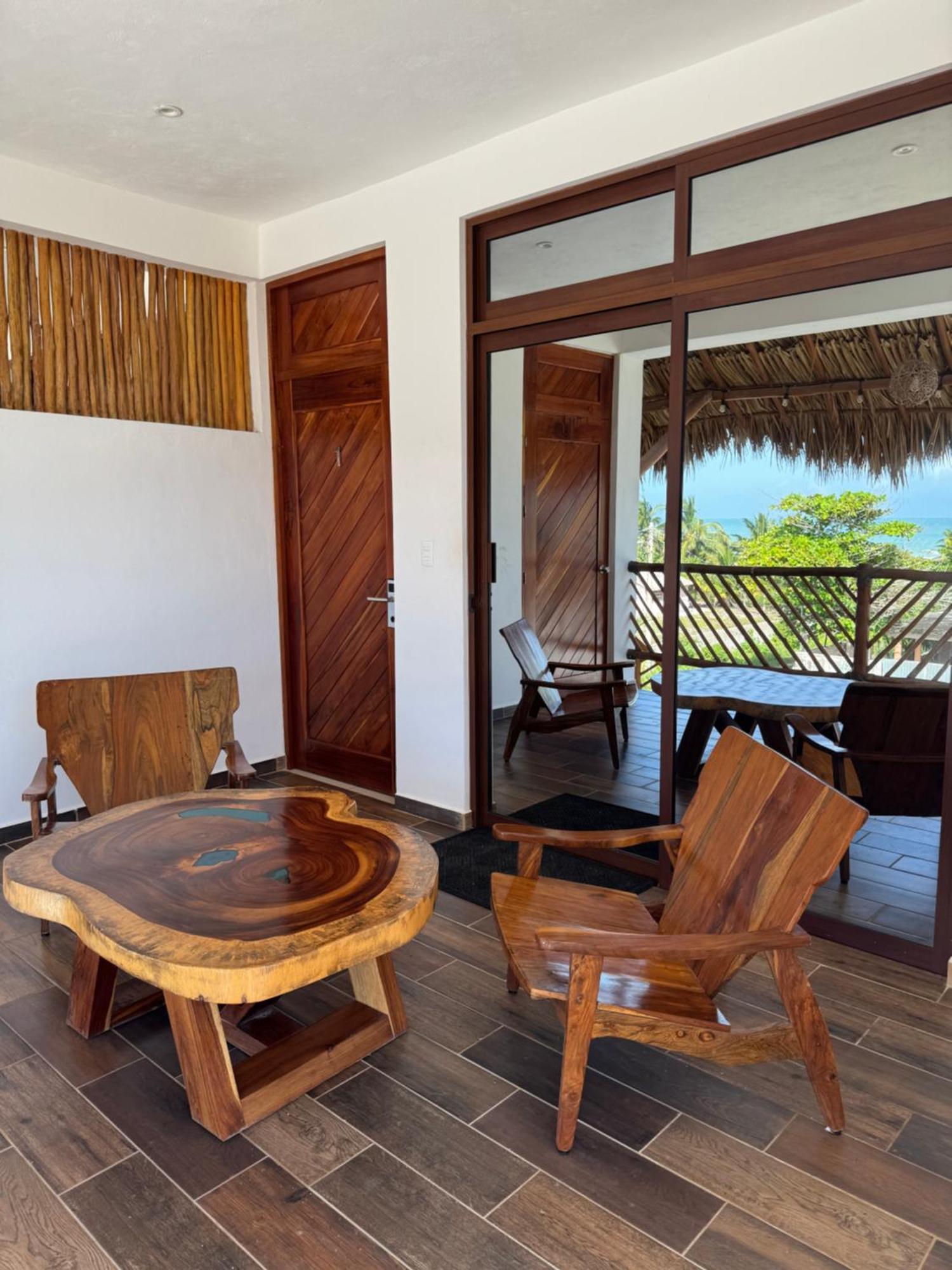 Mexhe Hotel El Cuyo Exteriör bild